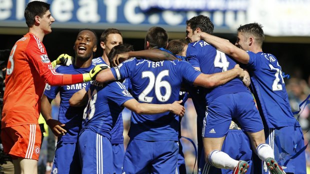 Champions: Chelsea players celebrate a job well done this season. 