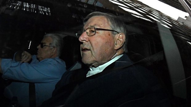 George Pell arrives to his lawyer office.