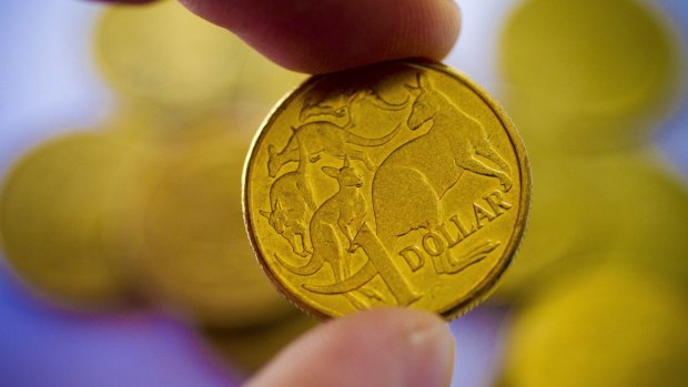 The Australian dollar briefly broke through US77 cents to a three-week high.