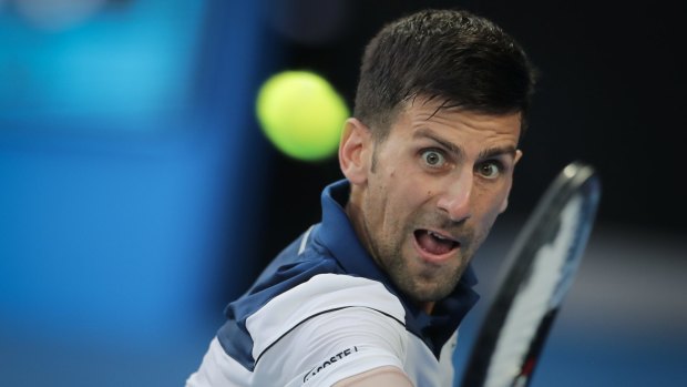 Novak Djokovic with eyes on the ball at the Australian Open.