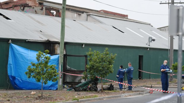 Police and forensic officers at the scene in Footscray on Thursday.