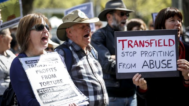 People protest against Transfield at its head office in Melbourne. 