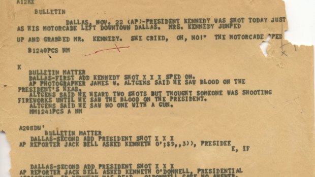 An Associated Press "A" wire copy edited for the teletypesetter circuit, reporting on the assignation of President John F. Kennedy in Dallas. 