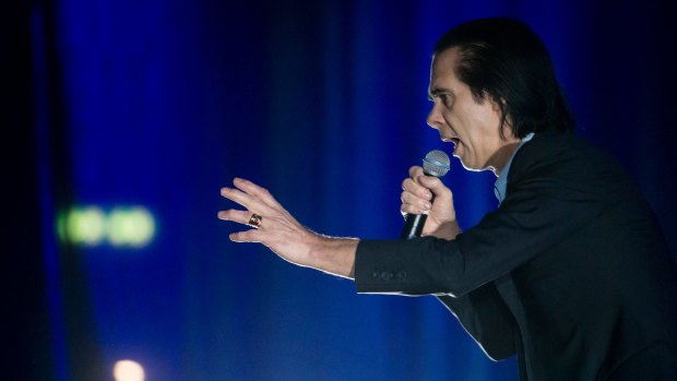Nick Cave performing with The Bad Seeds