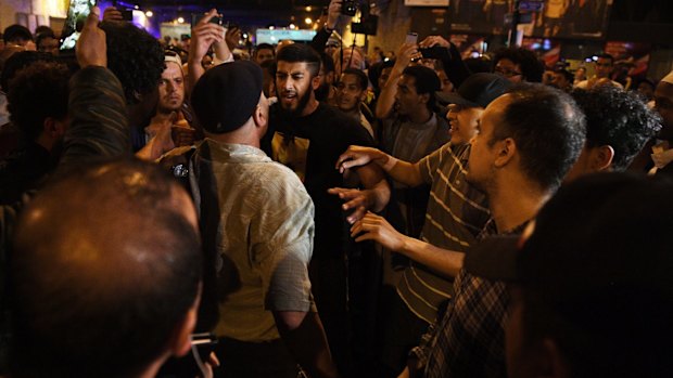 A confrontation near a police cordon at Finsbury Park. The "revenge attack" rhetoric surrounding the incident mirrors that of Osama bin Laden.