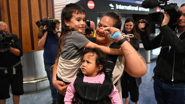 Lisa Te Tai and her granddaughter Manaia arrive in Auckland to be greater by her son Marcelle Te Tai and her grandson.