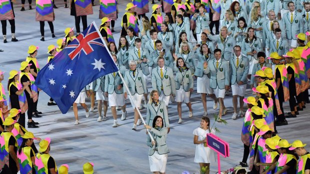 Happier times: Anna Meares Australia into the opening ceremony.
