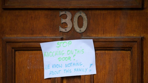A sign left for the media on a neighbour's door near the home of bomber Salman Abedi in Manchester.