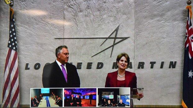 Australian ambassador to the US Joe Hockey appears with Lockheed Martin chief executive Marillyn Hewson via video link before Christopher Pyne's tour of the Lockheed Martin office in Carlton, Melbourne, in August. 