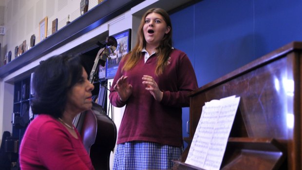 Key to learning: Koo Wee Rup Secondary College's Director of Music Claudia Barker works with her student Emma Wallace who hopes to be an opera singer.