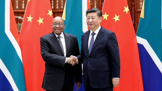 Chinese President Xi Jinping (right) shake hands with South African President Jacob Zuma ahead of the G20 meeting in Hangzhou, China. 