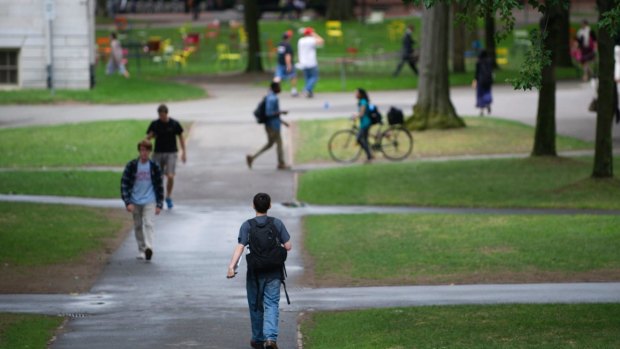 Students walk across Harvard University's campus in Massachusetts. Some faculty say that too much power rests in the hands of the university's Title IX office.  