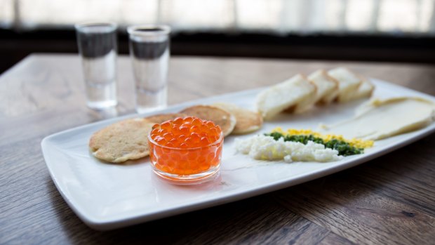 Caviar & Roe yeasted blini, challah, chive, butter, sieved egg.