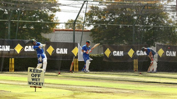 Australian players go through their paces at the WACA nets  on Thursday.