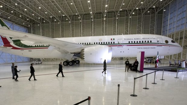 Mexican President Andres Manuel Lopez Obrador, centre left, has been trying to sell off the country's presidential jet, a Boeing 787 Dreamliner, for more than two years.