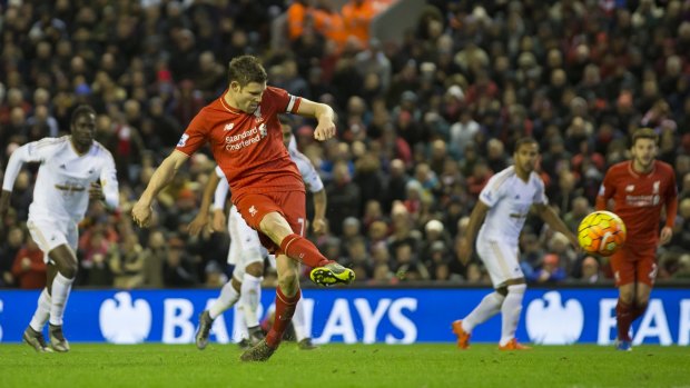 From the spot: Liverpool's James Milner scores a penalty.