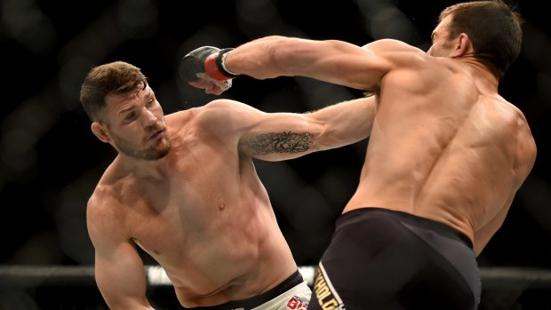 Upset: Michael Bisping, left, would defeat Rockhold for the title at UFC 199.