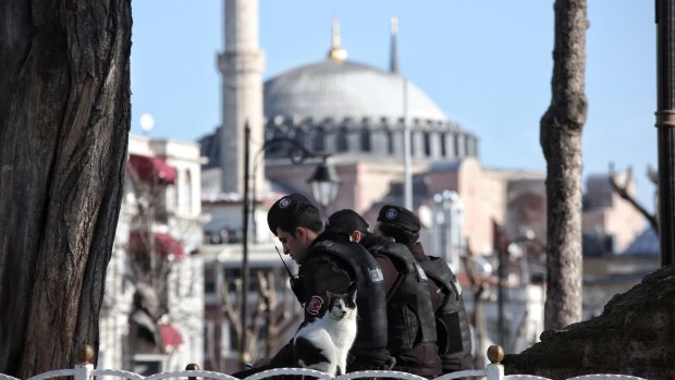 Turkish police attend the site of an explosion in the central Istanbul Sultanahmet district on January 12.