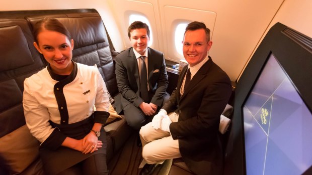Zac George (centre) became famous in the frequent flyer community after becoming the youngest person to ever fly in Etihad's luxurious Residence suite.