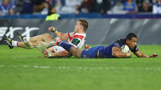 Controversial try: Will Hopoate touches down for the Bulldogs.