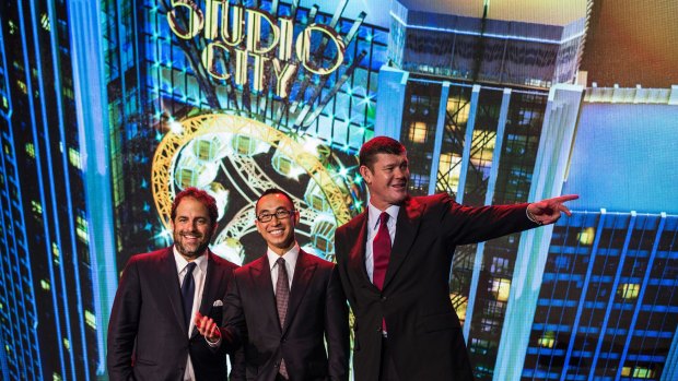 Filmmaker Brett Ratner, left, billionaire Lawrence Ho, CEO and co-chairman of Melco Crown Entertainment, centre, with James Packer.
