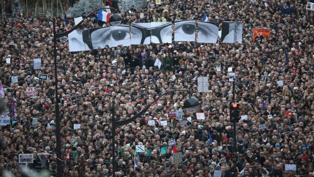 January 11, 2015: Demonstrators make their way along Boulevard Voltaire in a unity rally in Paris following the Charlie Hebdo attacks.