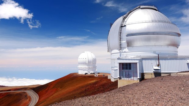 Observatories on top of Mauna Kea mountain peak.
