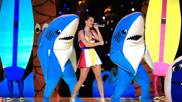 Katy Perry performs with her left and right shark during the 2015 Super Bowl.
