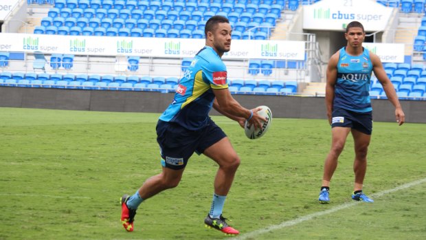 Sporting new colours: Jarryd Hayne training with the Gold Coast Titans on Thursday.