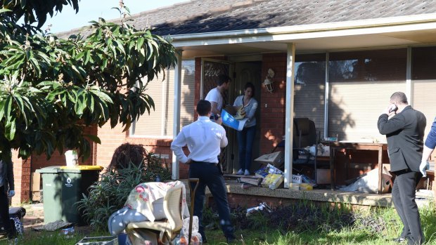 Police raid the house of Peter Zhurawel in Greystanes.
