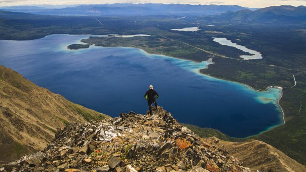 A hike to King's Throne summit in Saint Elias Mountains in Kluane National Park, Yukon, Canada, rewards you with a spectacular view above the Kathleen lake.