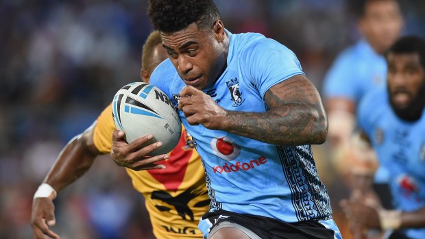 Fully committed: Kevin Naiqama of Fiji makes a break.