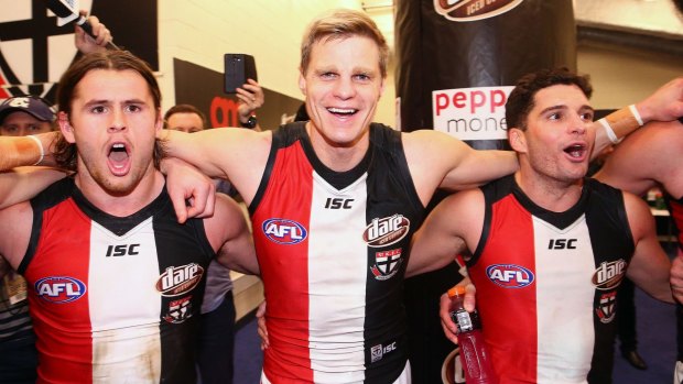 MELBOURNE, AUSTRALIA - JULY 23:  Maverick Weller of the Saints, Nick Riewoldt of the Saints  and Leigh Montagna of the Saints sing the song in the rooms after winning during the round 18 AFL match between the Western Bulldogs and the St Kilda Saints at Etihad Stadium on July 23, 2016 in Melbourne, Australia.  (Photo by Scott Barbour/Getty Images)