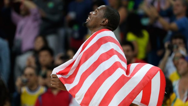 Proud: Kevin Durant celebrates after defeating Serbia during the men's gold medal game.