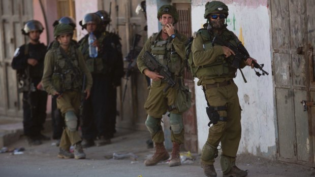Israeli security forces during clashes in the Fawwar refugee camp near Hebron in August, 2016.