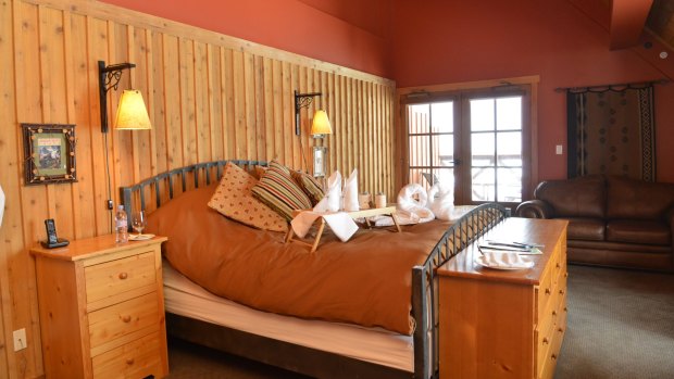 The suites have the feel of an old log cabin lost in the snowy wilderness.