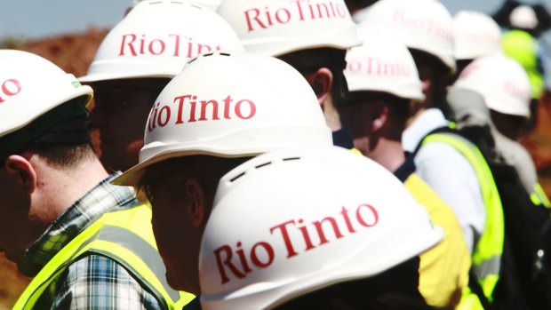 Wearing hard hats in the iron ore glut: Rio's debt investors benefit from the miner's push to reduce production costs to the lowest among its rivals.
