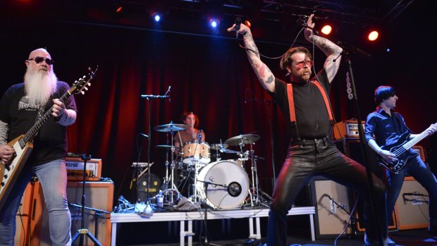 Singer Jesse Hughes of Eagles of Death Metal says the band is committed to finishing the Paris show that was stopped when Islamists killed 89 people during a terrorist attack at the Bataclan Theatre.