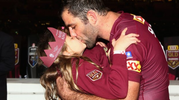 Backed: Cameron Smith kisses his daughter Jada after the match on Wednesday night.