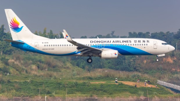 A Donghai Airlines pilot and flight attendant were suspended after a fight broke out between them mid-flight.
