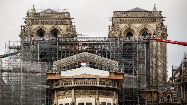 The dismantling of the Notre-Dame cathedral scaffolding began Monday.