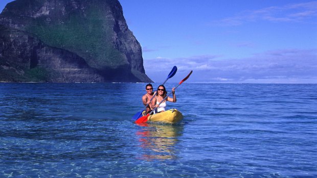 Paddling a kayak on Lord Howe's blue waters.