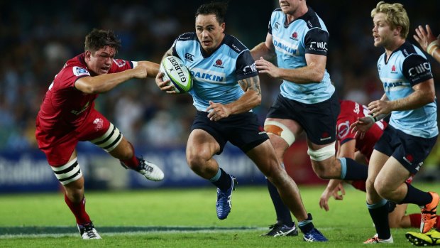 New colours: Zac Guildford makes a break during the round one Super Rugby match between the Waratahs and the Reds at Allianz Stadium.