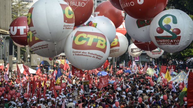 A sea of red: A demonstration in favour of Brazil's President Dilma Rousseff and the ruling Workers' Party (PT) in Sao Paulo on March 18.