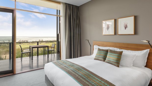 The rooms make the most of the location, with floor-to-ceiling windows offering panoramic views of the ocean and across to Venus Bay. 