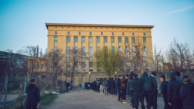 Hopefuls queue to enter Berghain ... many will be refused entry.