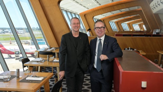 Alan Joyce (R), Qantas chief executive, announced upgrades for its lounge network, including changes to its food and beverage offering, led by chef Neil Perry (L).
