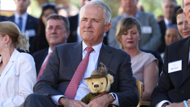 Prime Minister Malcolm Turnbull holds Trooper Jones, the light horse fundraising bear, during a visit to Soldier On in Canberra on Friday. 