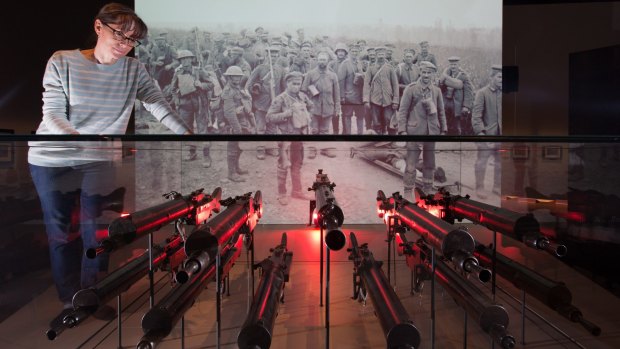 Reminder: Director of public programs Sam Heywood looks over exhibits at the WWI Centenary Exhibition at Melbourne Museum.