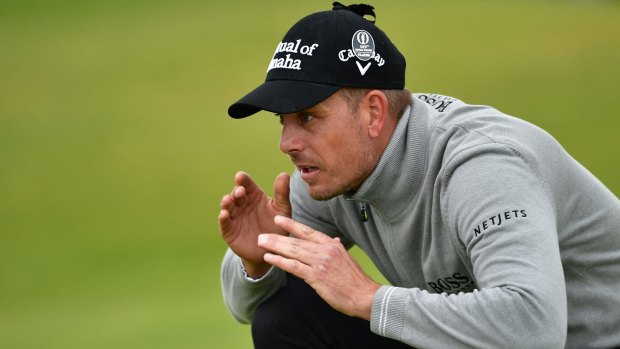 Focus: Henrik Stenson lines up a putt on the 14th green.